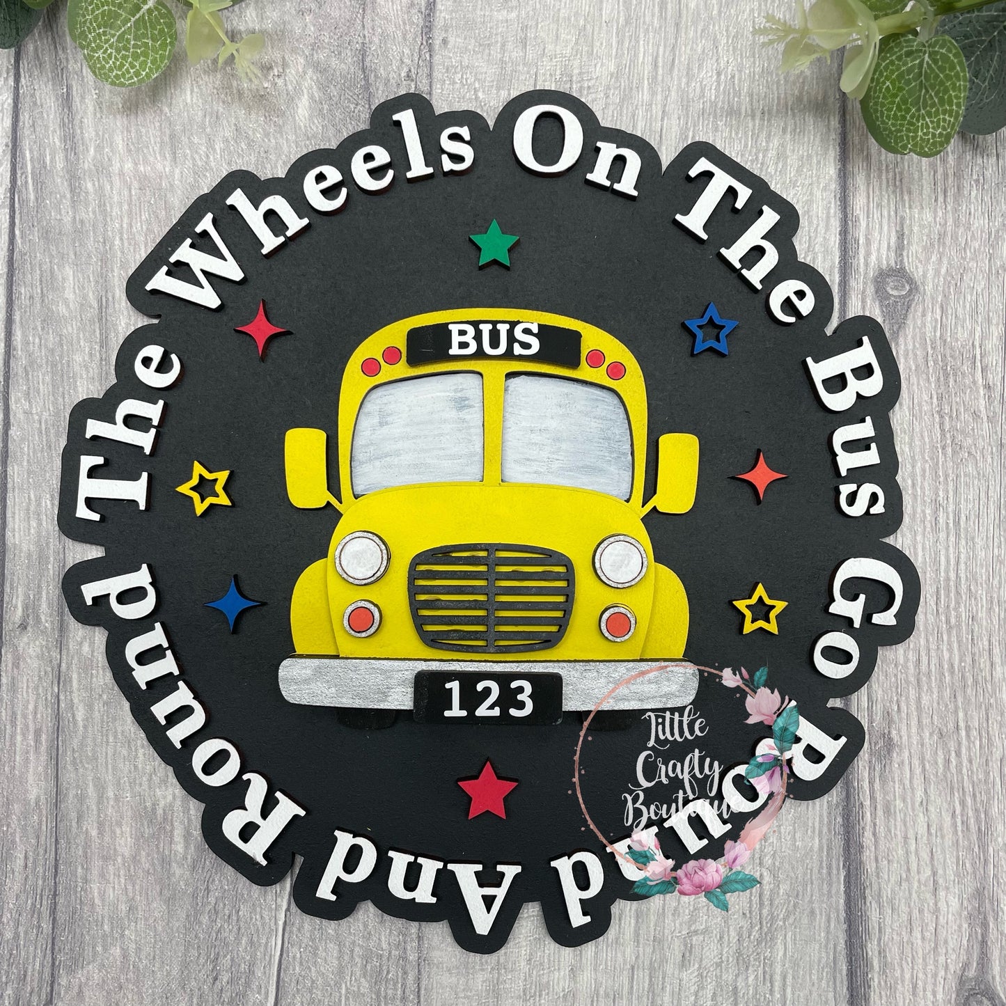 The wheels on the bus plaque