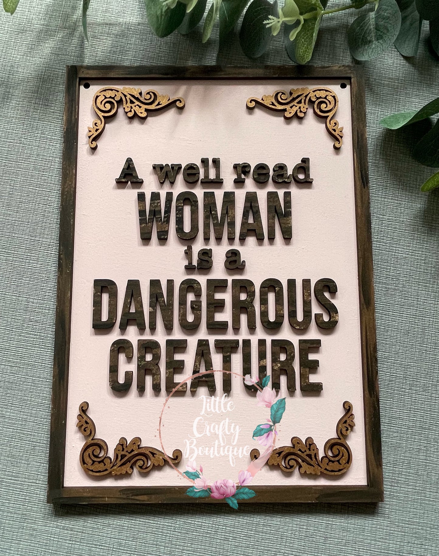 A well read woman plaque