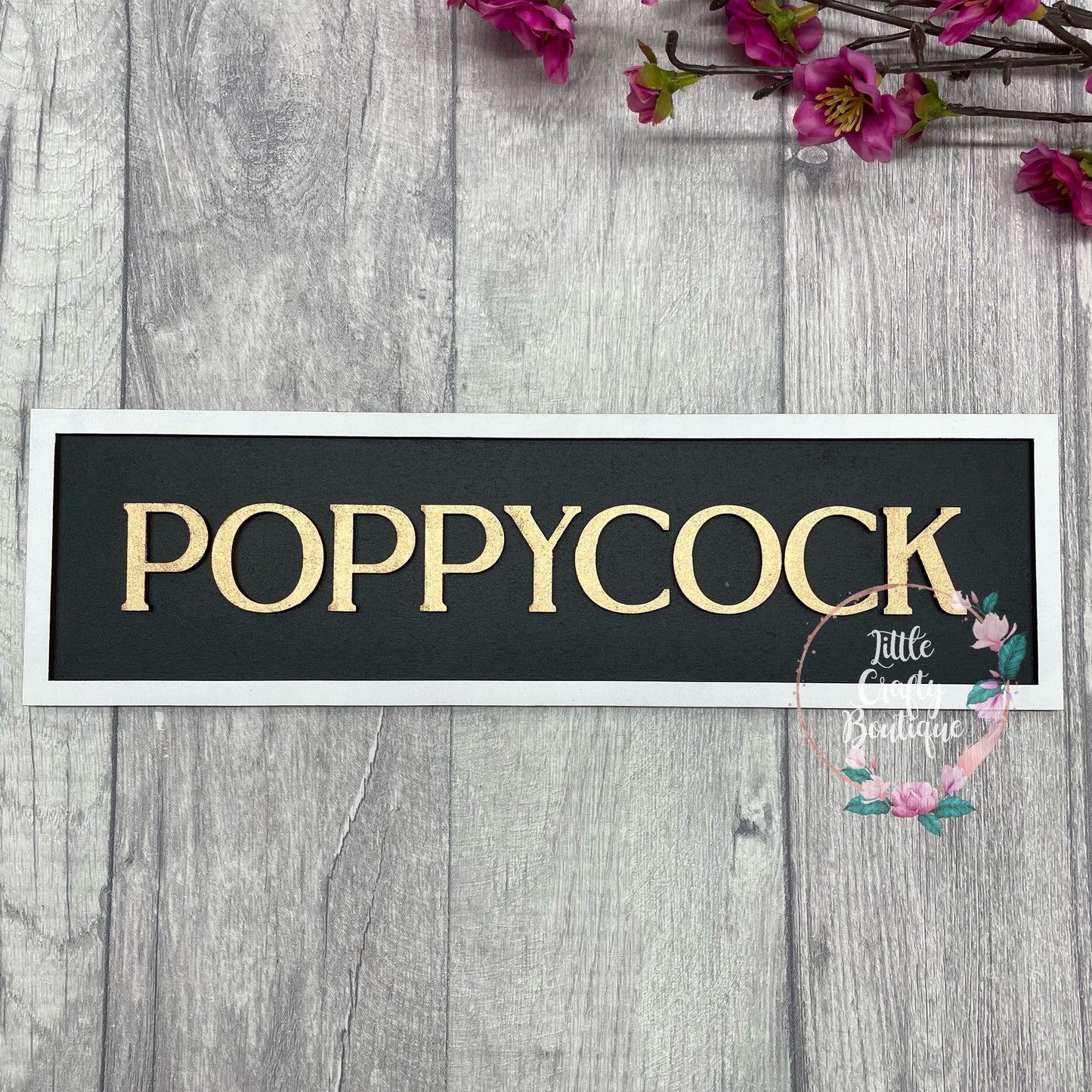 Poppycock plaque